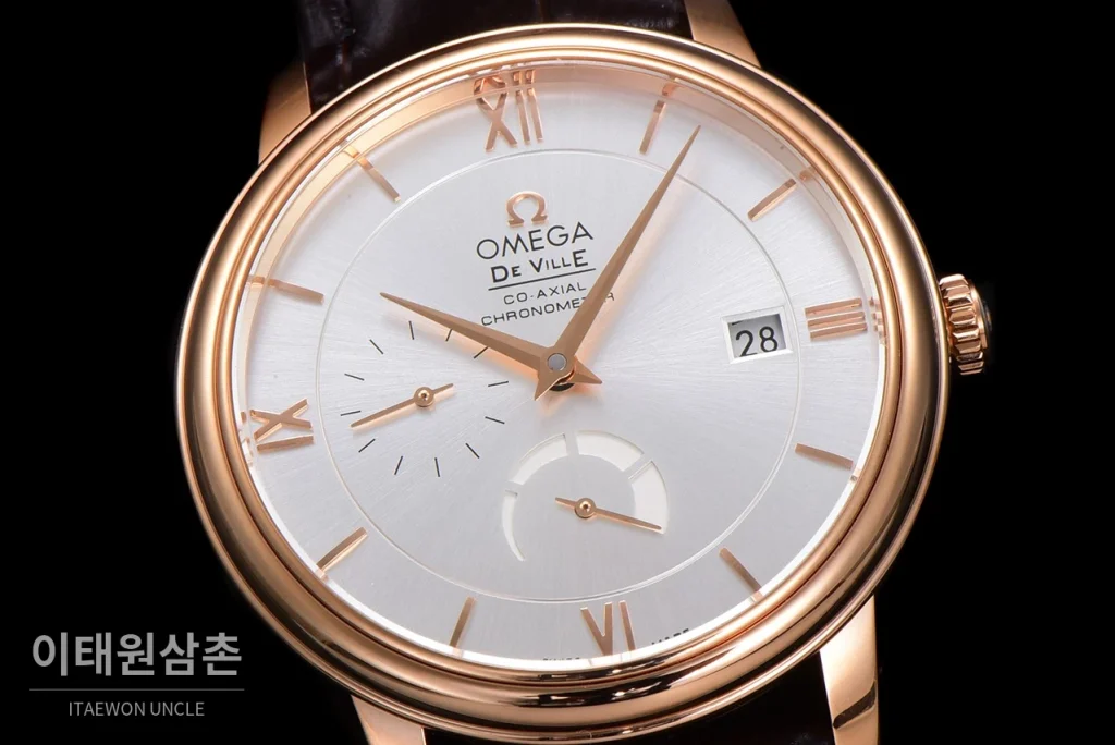 오메가 드빌 파워리저브 데이트 스몰세컨즈 오토매틱 39.5mm 실버 브라운 가죽 스트랩 로즈골드 베젤