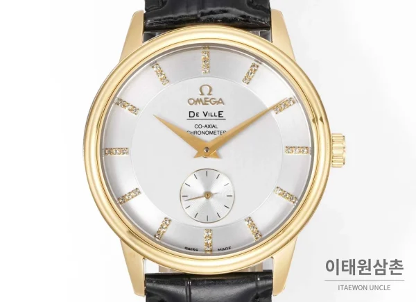 오메가 드빌 스틸 실버다이얼 오토매틱 가죽스트랩 드레스워치 39mm 골드 베젤