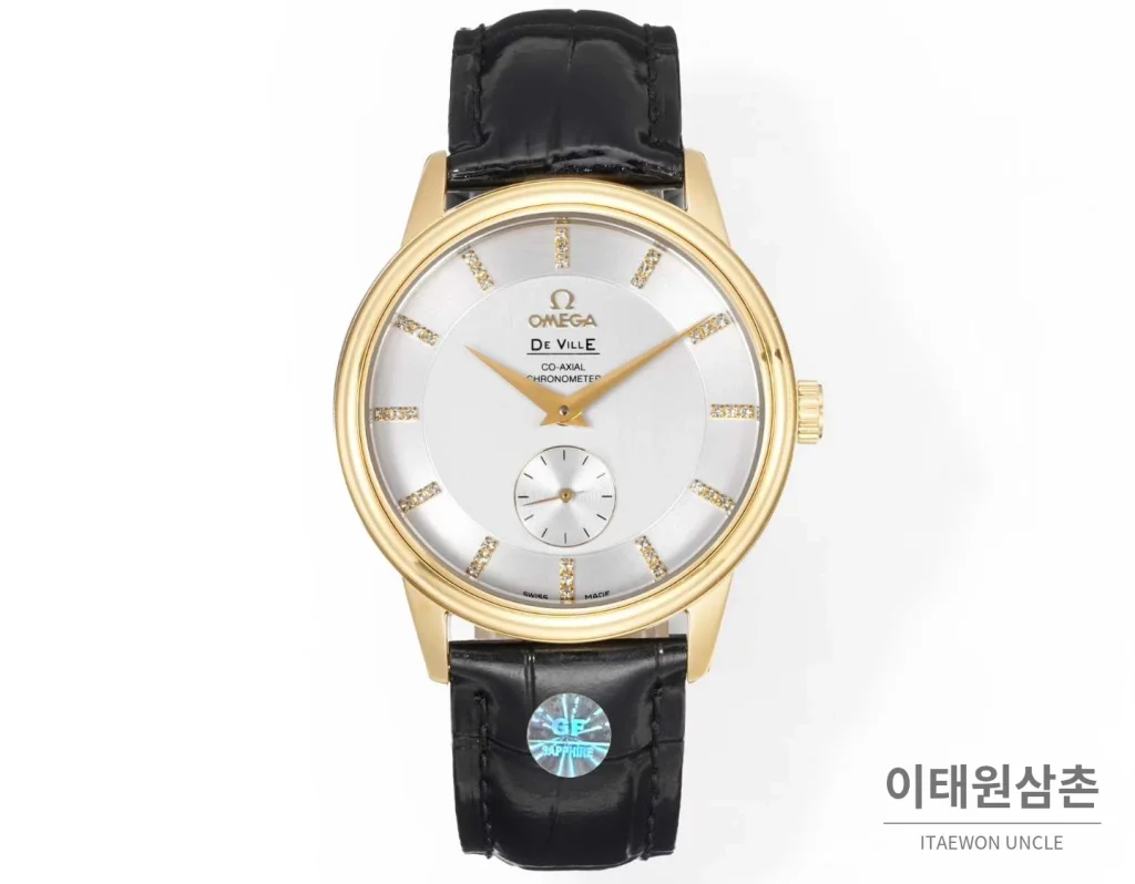 오메가 드빌 스틸 실버다이얼 오토매틱 가죽스트랩 드레스워치 39mm 골드 베젤