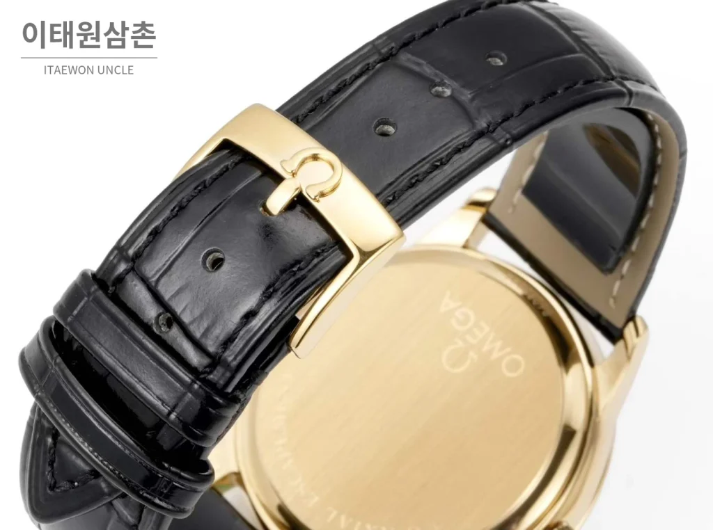 오메가 드빌 스틸 실버다이얼 오토매틱 가죽스트랩 드레스워치 39mm 골드 베젤