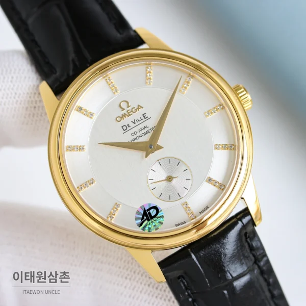 오메가 드빌 오토매틱 39mm 샴페인 다이얼 블랙 가죽 스트랩 골드 케이스