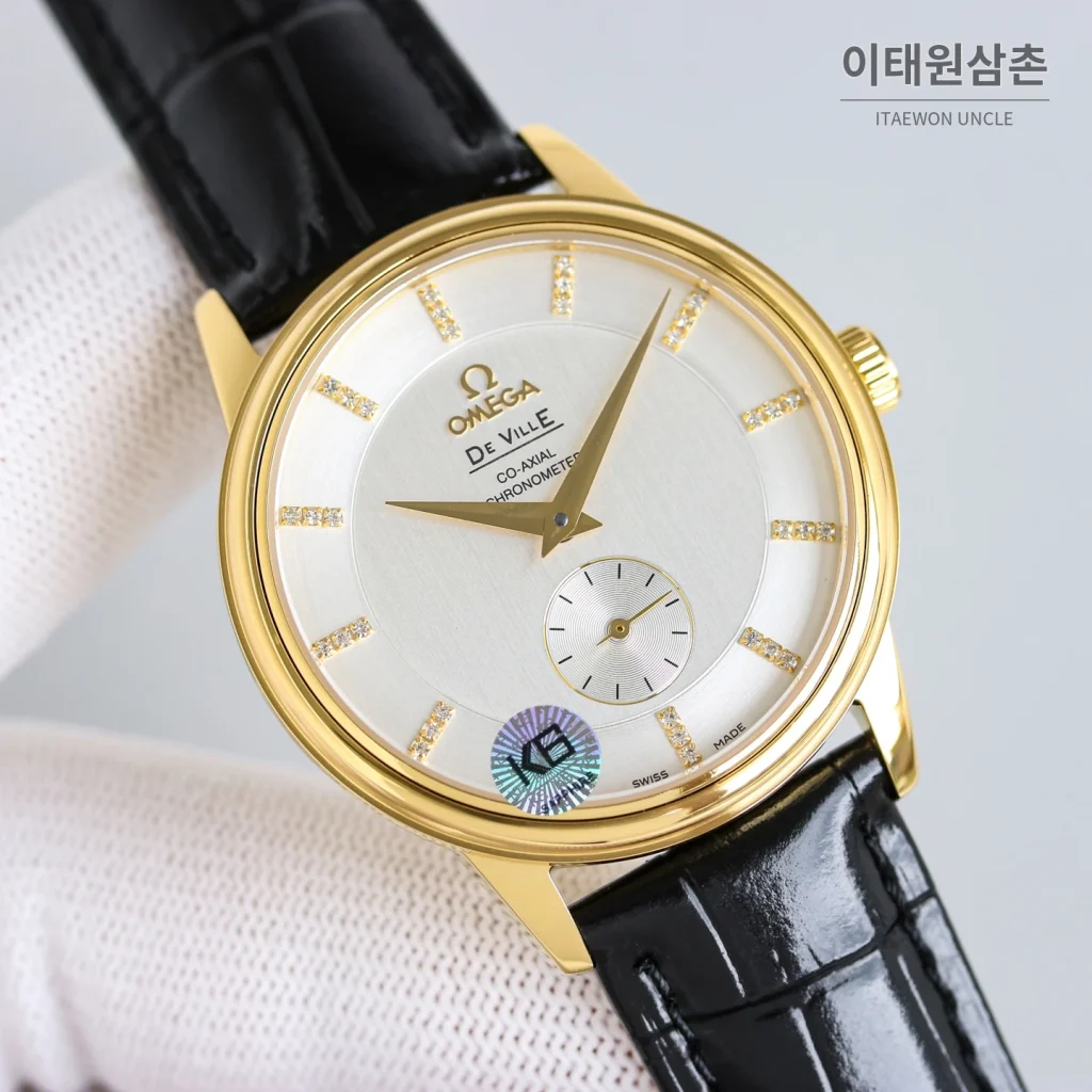 오메가 드빌 오토매틱 39mm 화이트 다이얼 블랙 가죽 스트랩 골드 베젤