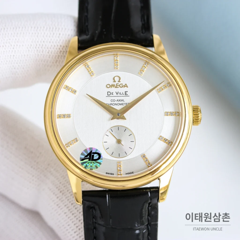오메가 드빌 오토매틱 39mm 샴페인 다이얼 블랙 가죽 스트랩 골드 케이스