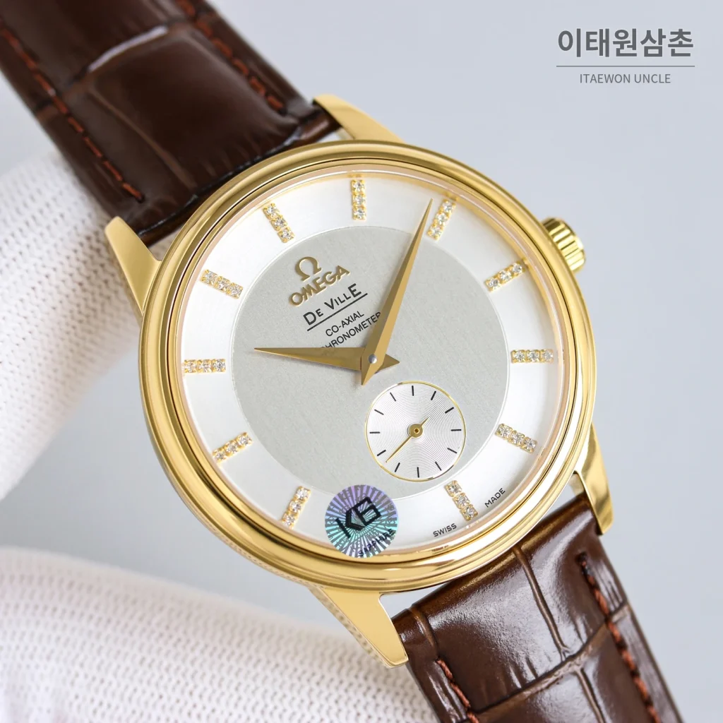 오메가 드빌 오토매틱 39mm 실버 다이얼 브라운 가죽 스트랩 골드 케이스