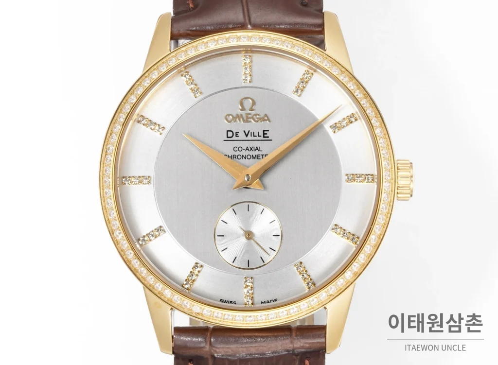 오메가 드빌 오토매틱 39mm 실버 다이얼 브라운 가죽 스트랩 골드 베젤