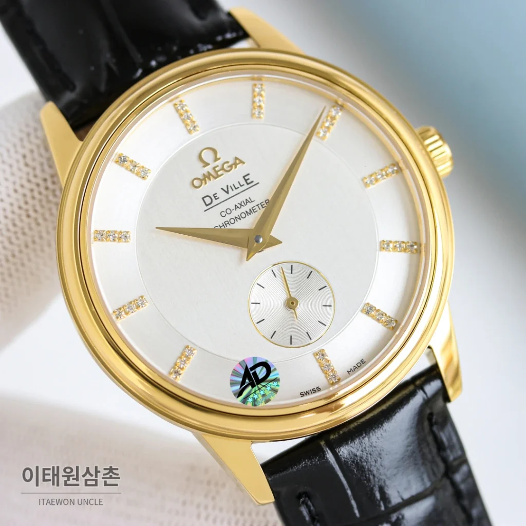 오메가 드빌 오토매틱 39mm 샴페인 다이얼 블랙 가죽 스트랩 골드 케이스