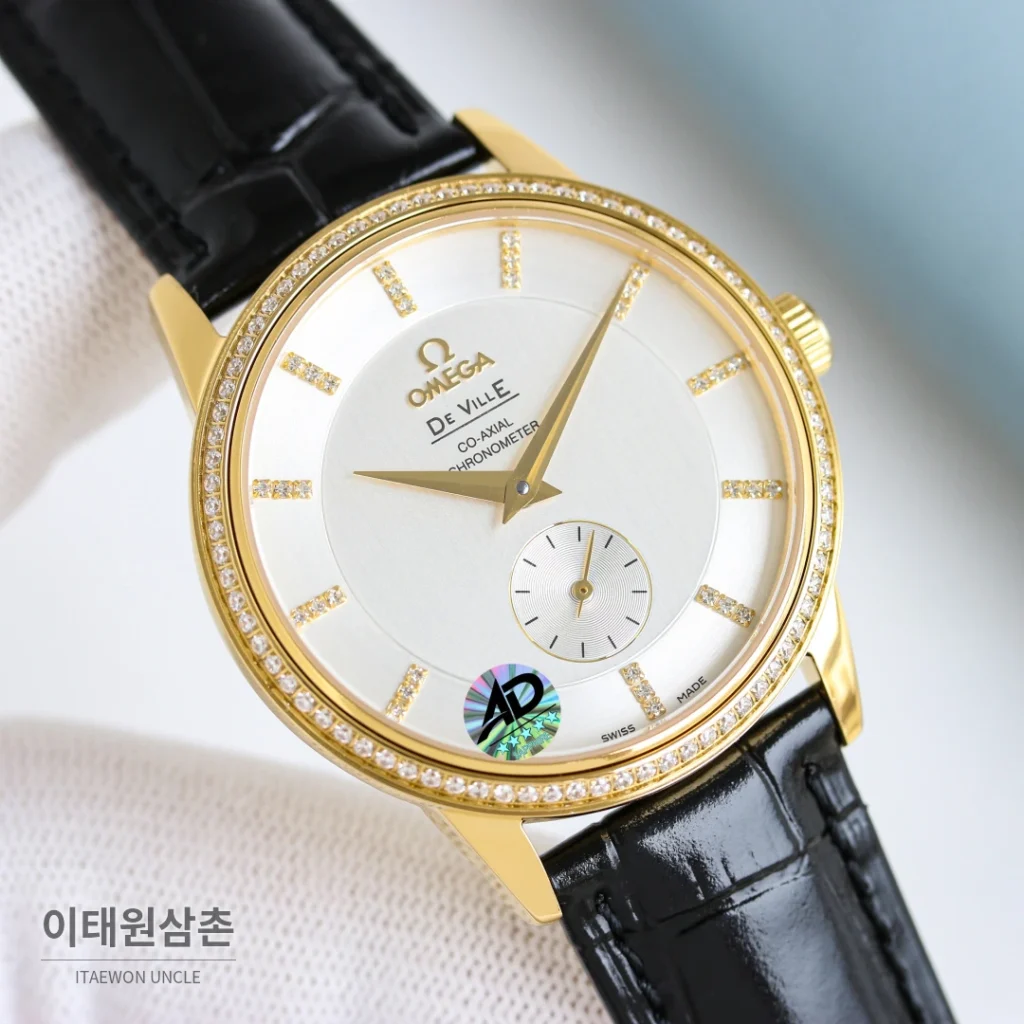 오메가 드빌 오토매틱 39mm 샴페인 다이얼 블랙 가죽 스트랩 골드 케이스