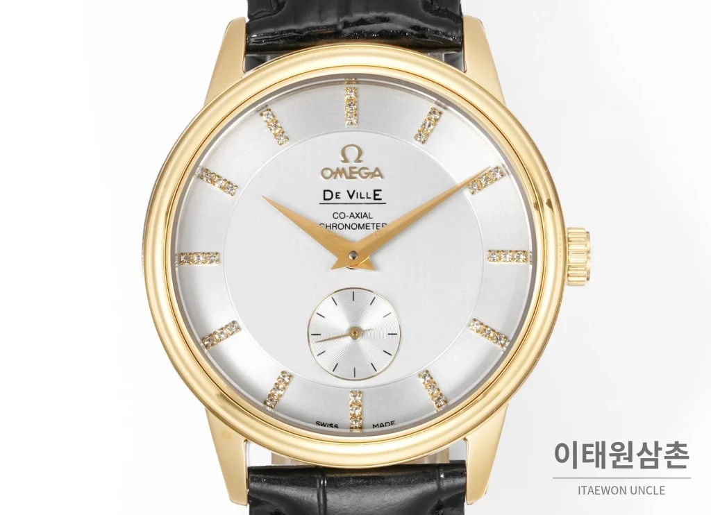 오메가 드빌 오토매틱 39mm 실버 다이얼 블랙 가죽 스트랩 골드 베젤