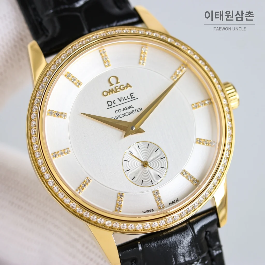 오메가 드빌 오토매틱 39mm 화이트 다이얼 블랙 가죽 스트랩 골드 베젤