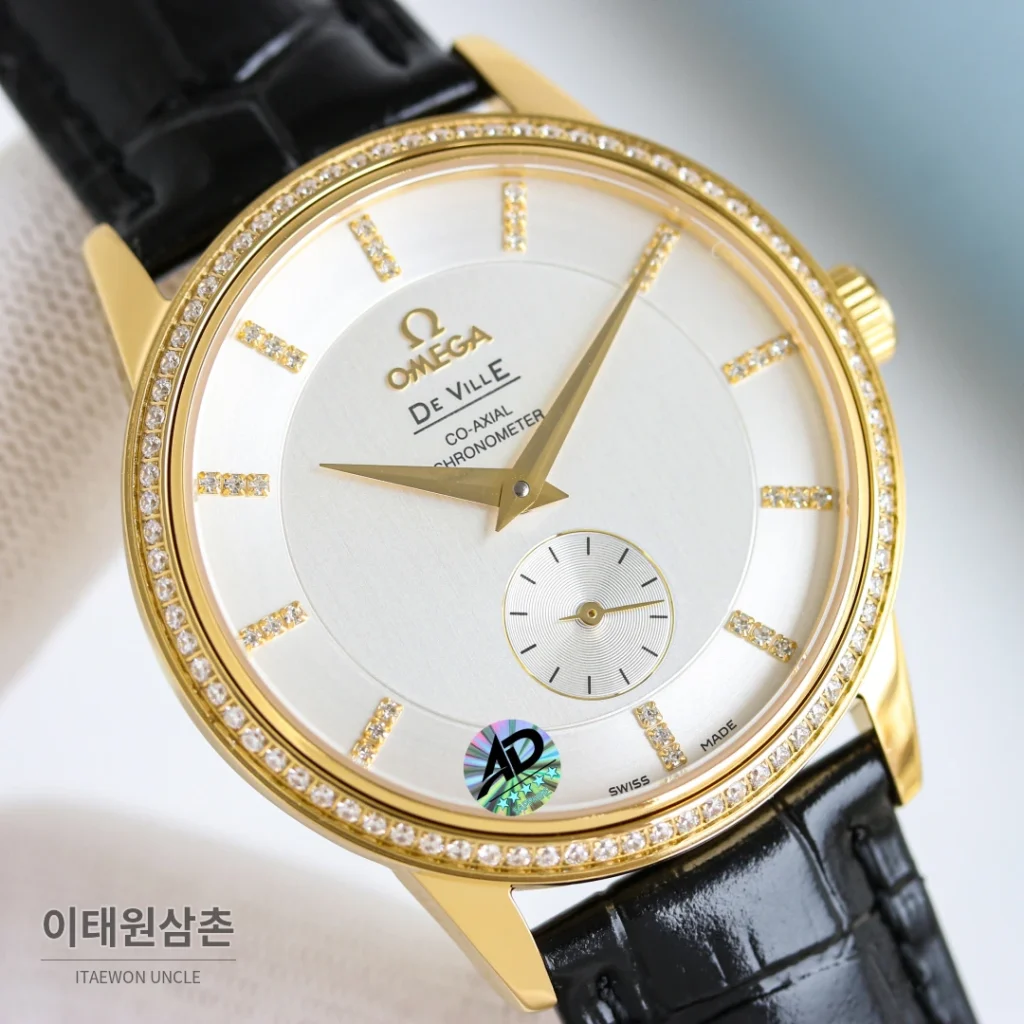 오메가 드빌 오토매틱 39mm 샴페인 다이얼 블랙 가죽 스트랩 골드 케이스