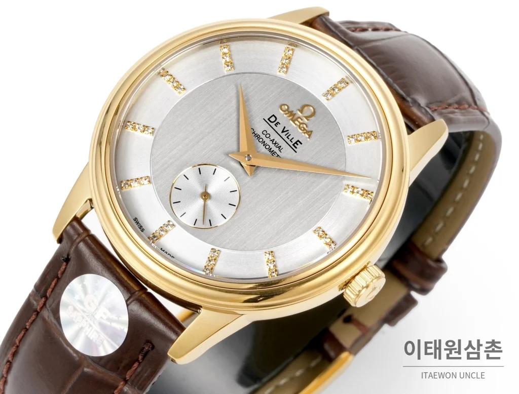 오메가 드빌 오토매틱 39mm 실버 다이얼 브라운 가죽 스트랩 골드 베젤