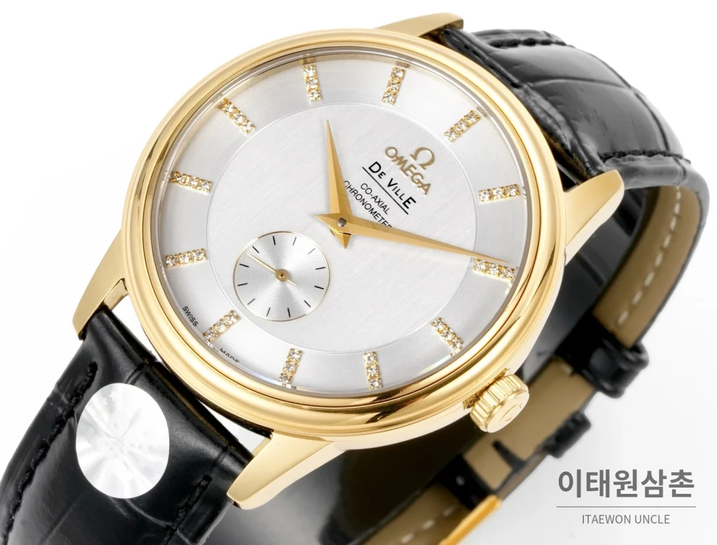 오메가 드빌 오토매틱 39mm 실버 다이얼 블랙 가죽 스트랩 골드 베젤