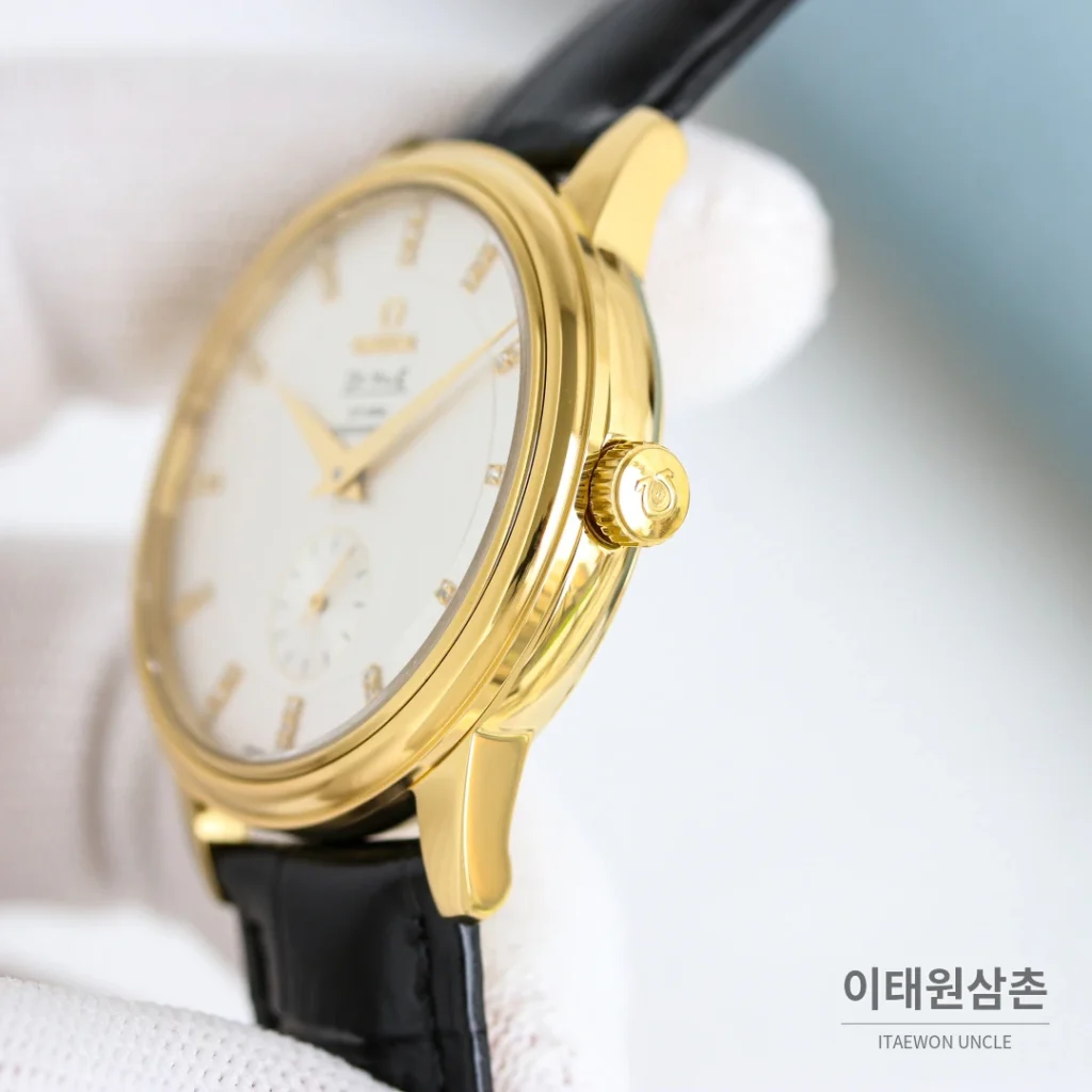 오메가 드빌 오토매틱 39mm 샴페인 다이얼 블랙 가죽 스트랩 골드 케이스