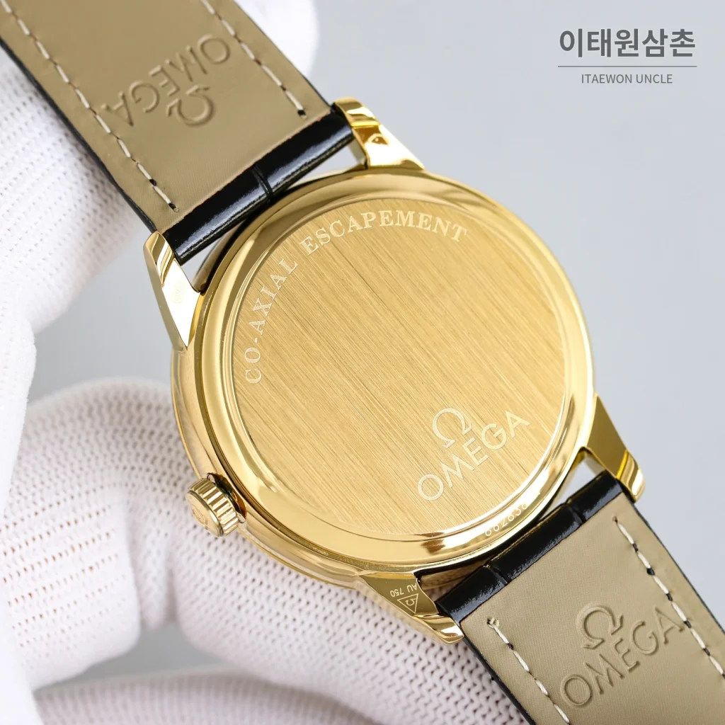 오메가 드빌 오토매틱 39mm 화이트 다이얼 블랙 가죽 스트랩 골드 베젤