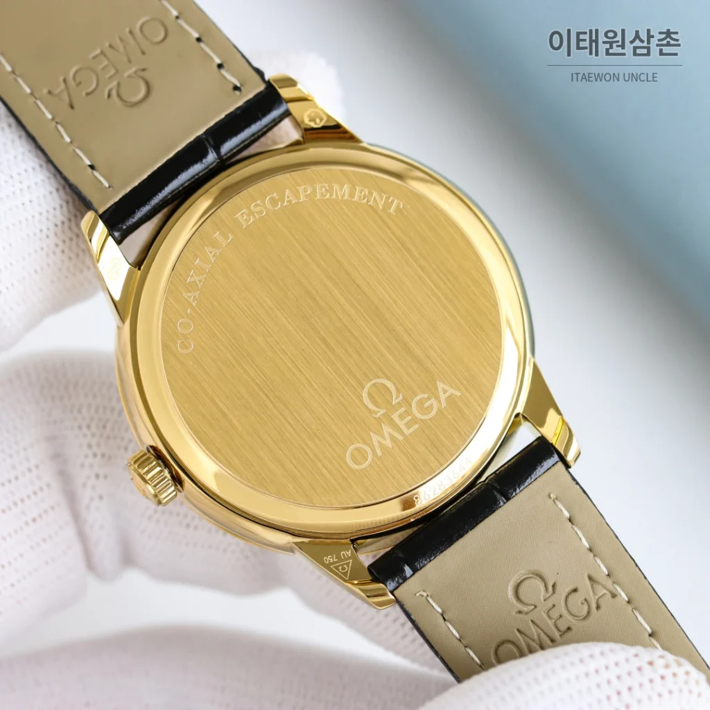 오메가 드빌 오토매틱 39mm 샴페인 다이얼 블랙 가죽 스트랩 골드 케이스