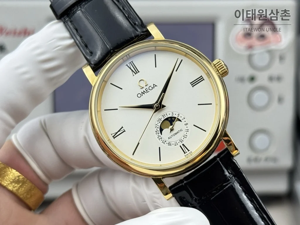 오메가 문페이즈 오토매틱 40mm 샴페인 다이얼