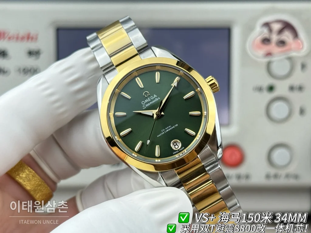 오메가 씨마스터 오토매틱 34mm 그린 다이얼 투톤 브레이슬릿 골드 베젤