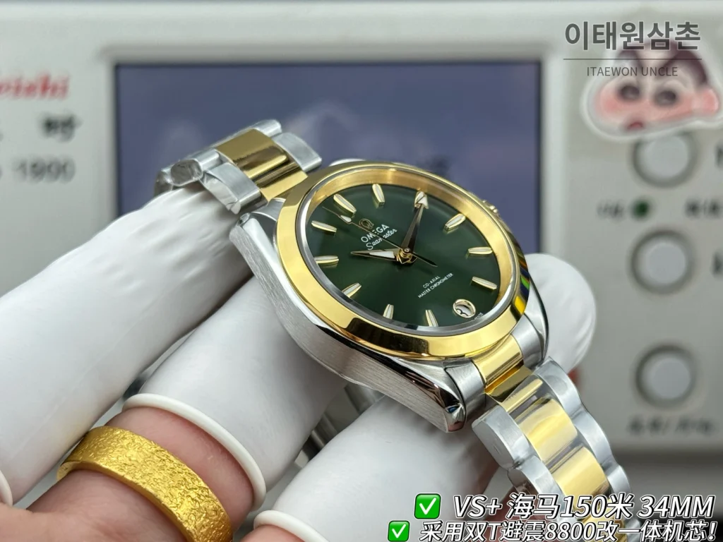 오메가 씨마스터 오토매틱 34mm 그린 다이얼 투톤 브레이슬릿 골드 베젤