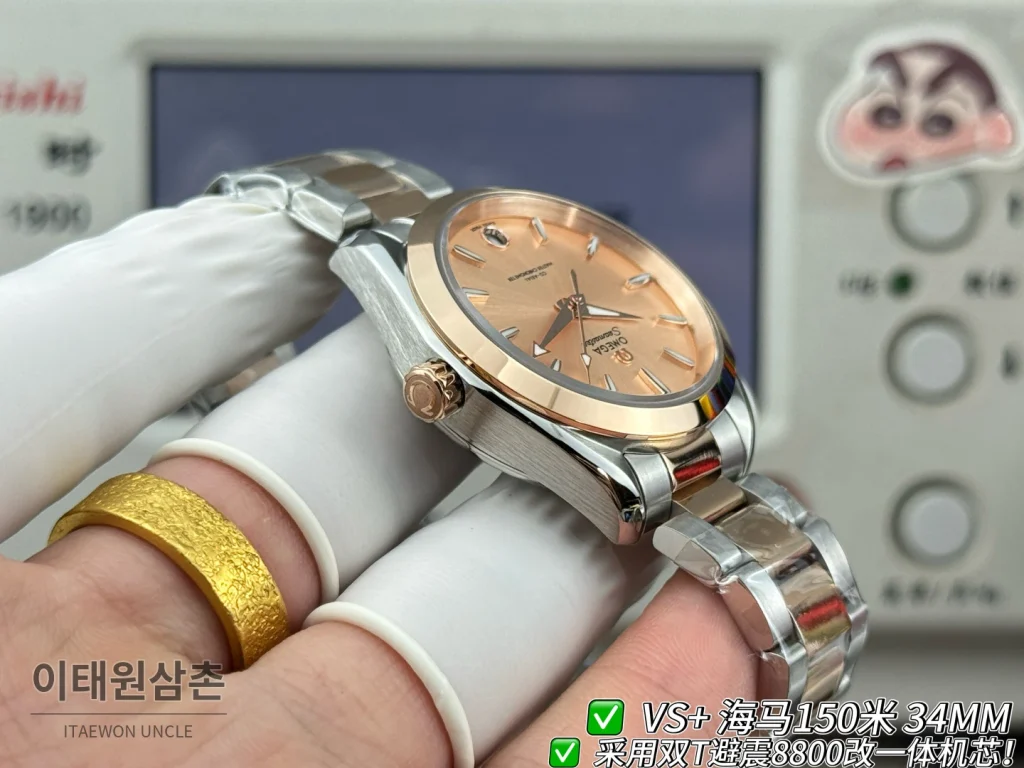 오메가 씨마스터 오토매틱 34mm 샴페인 다이얼 투톤 브레이슬릿 로즈골드 베젤