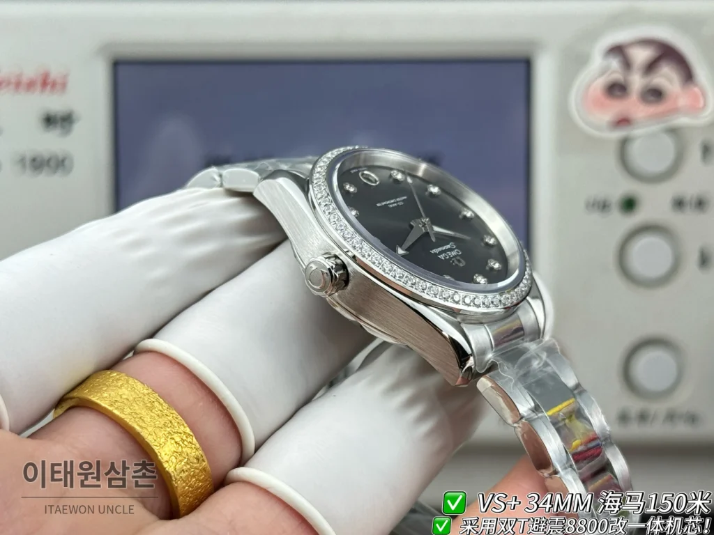 오메가 씨마스터 오토매틱 34mm 블랙 다이얼 스틸 브레이슬릿 실버 베젤