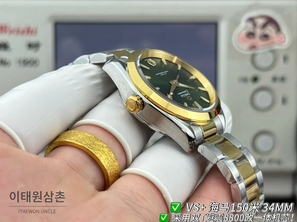 오메가 씨마스터 오토매틱 34mm 그린 다이얼 투톤 브레이슬릿 골드 베젤