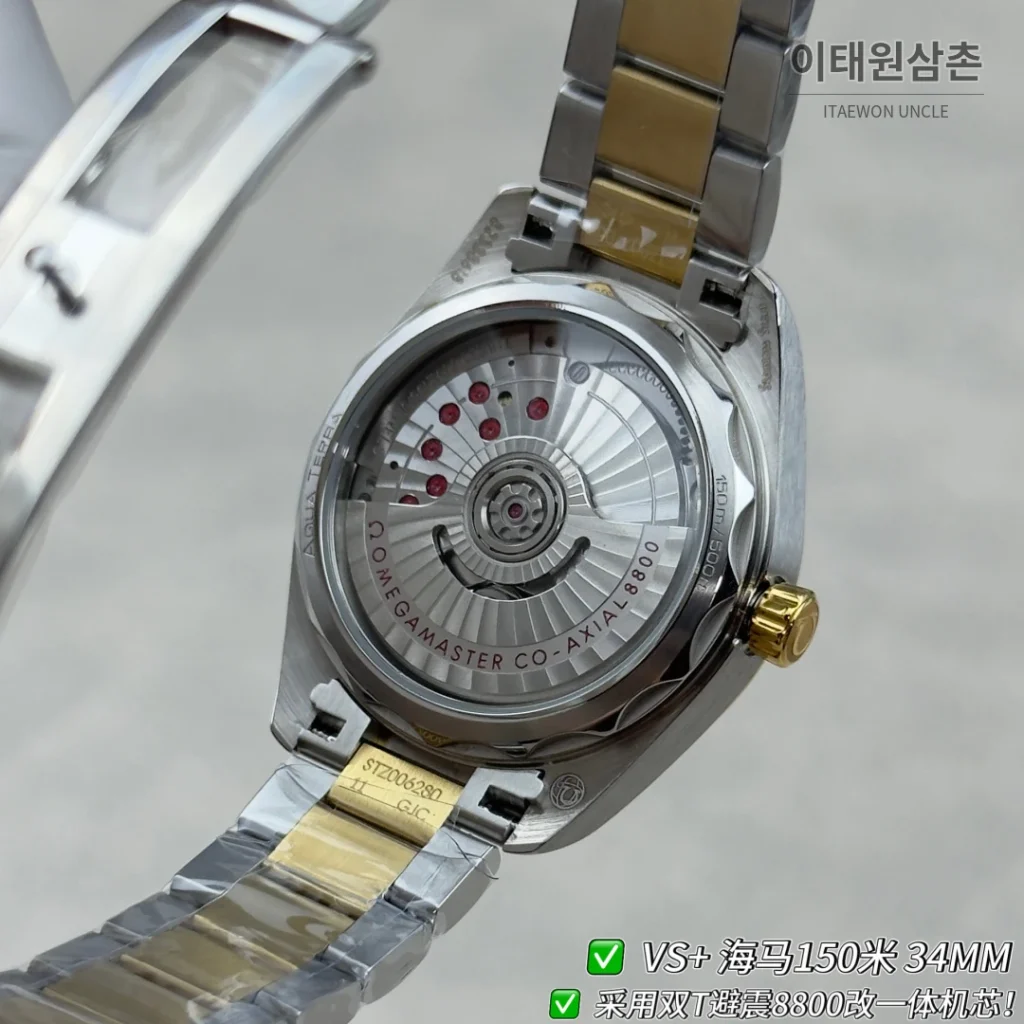 오메가 씨마스터 오토매틱 34mm 그린 다이얼 투톤 브레이슬릿 골드 베젤