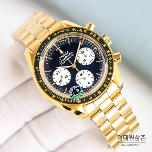 오메가 스피드마스터 문워치 리버스 팬더 크로노그래프 매뉴얼 42mm 블랙 다이얼 골드 브레이슬릿