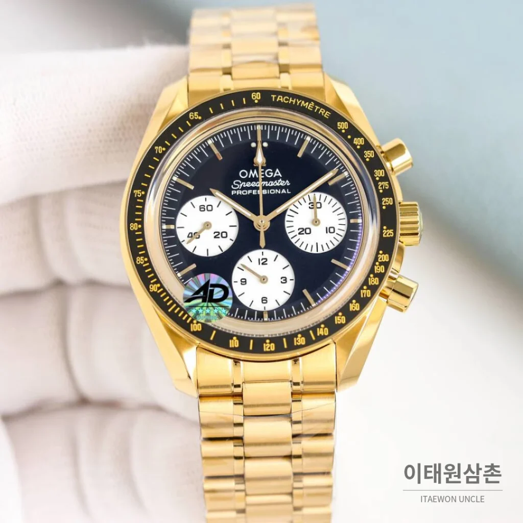 오메가 스피드마스터 문워치 리버스 팬더 크로노그래프 매뉴얼 42mm 블랙 다이얼 골드 브레이슬릿