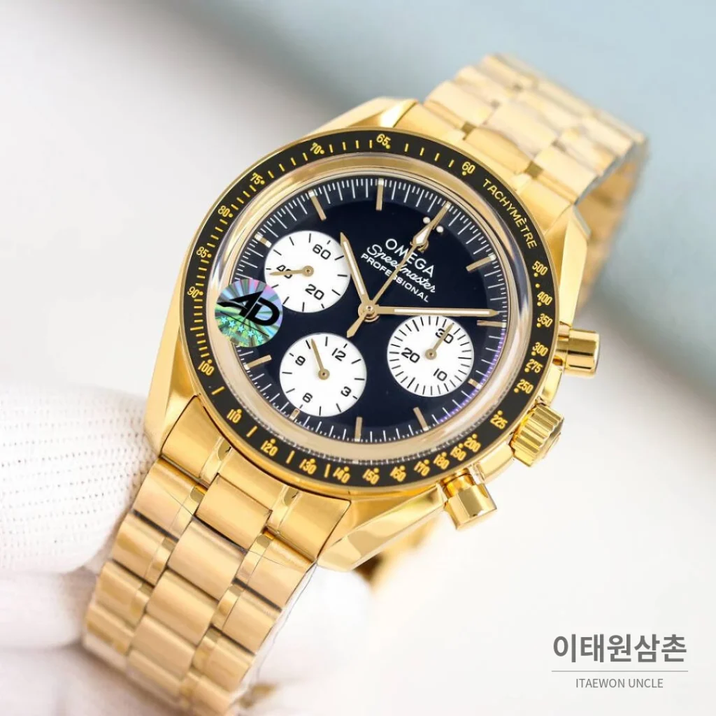 오메가 스피드마스터 문워치 리버스 팬더 크로노그래프 매뉴얼 42mm 블랙 다이얼 골드 브레이슬릿