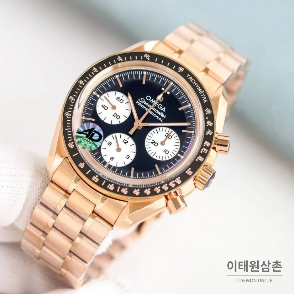 오메가 스피드마스터 문워치 리버스 팬더 크로노그래프 매뉴얼 42mm 블랙 다이얼 로즈골드 브레이슬릿