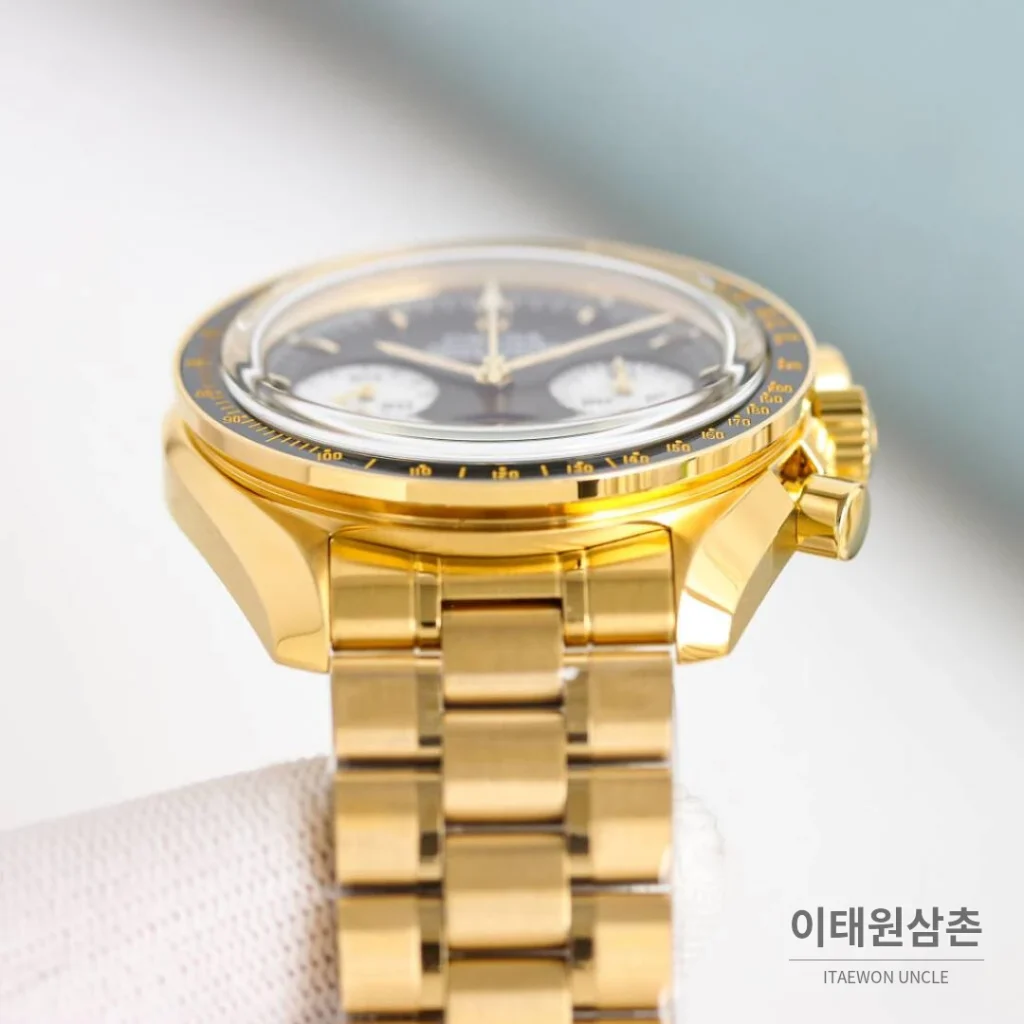 오메가 스피드마스터 문워치 리버스 팬더 크로노그래프 매뉴얼 42mm 블랙 다이얼 골드 브레이슬릿