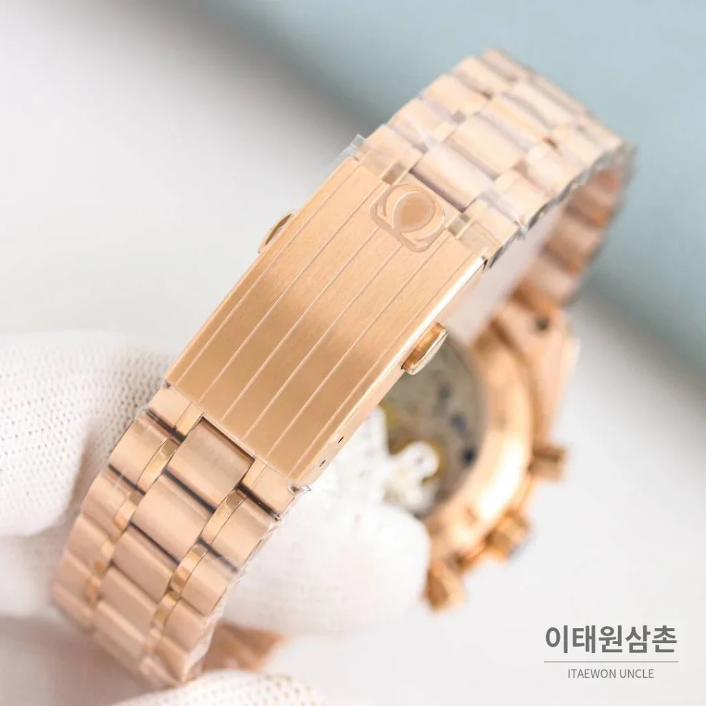 오메가 스피드마스터 문워치 리버스 팬더 크로노그래프 매뉴얼 42mm 블랙 다이얼 로즈골드 브레이슬릿