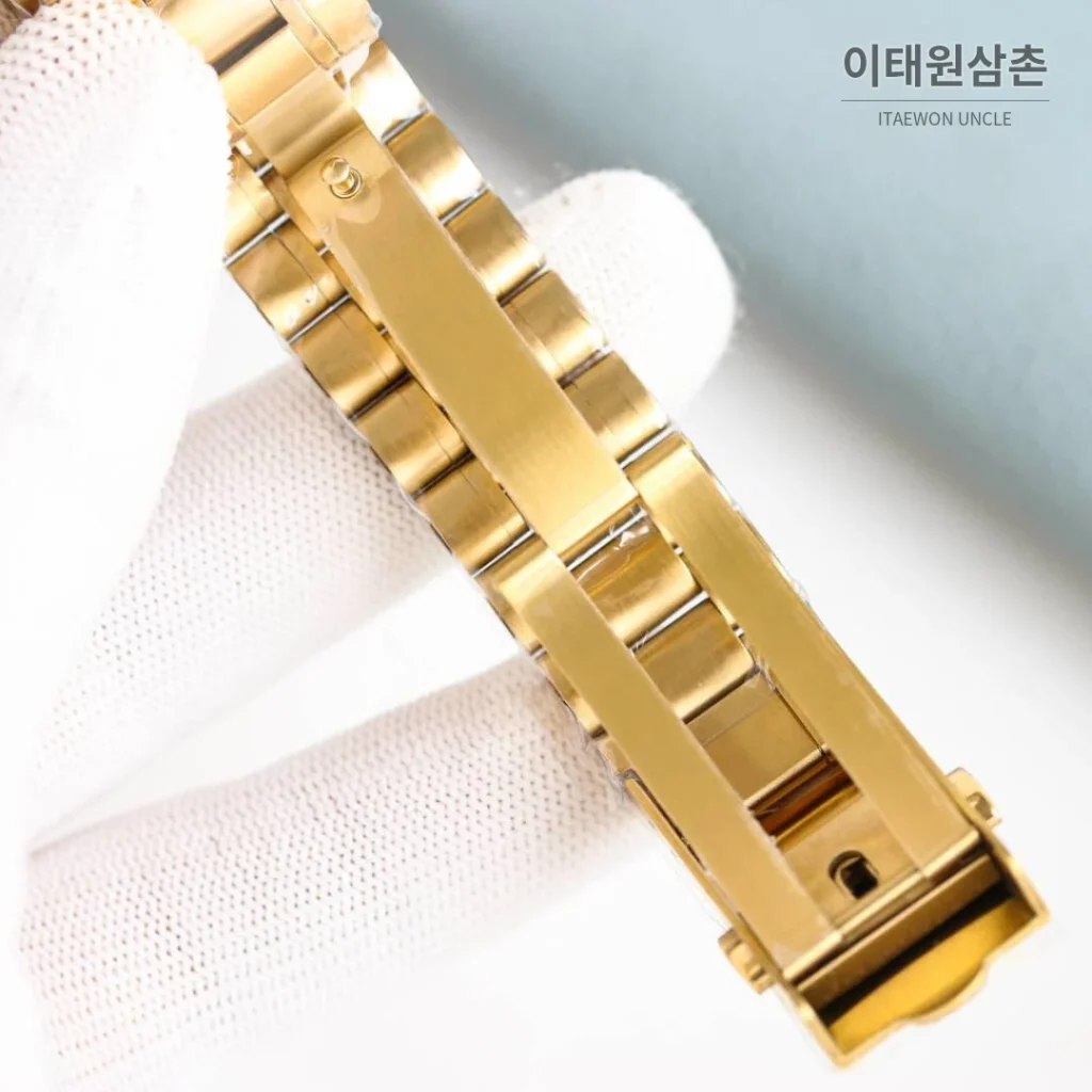 오메가 스피드마스터 문워치 리버스 팬더 크로노그래프 매뉴얼 42mm 블랙 다이얼 골드 브레이슬릿