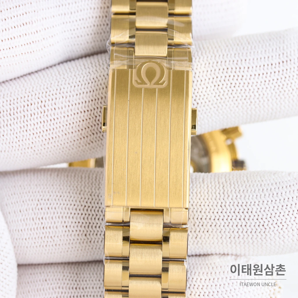 오메가 스피드마스터 프로페셔널 샴페인골드 그린다이얼 크로노그래프 수동 42mm