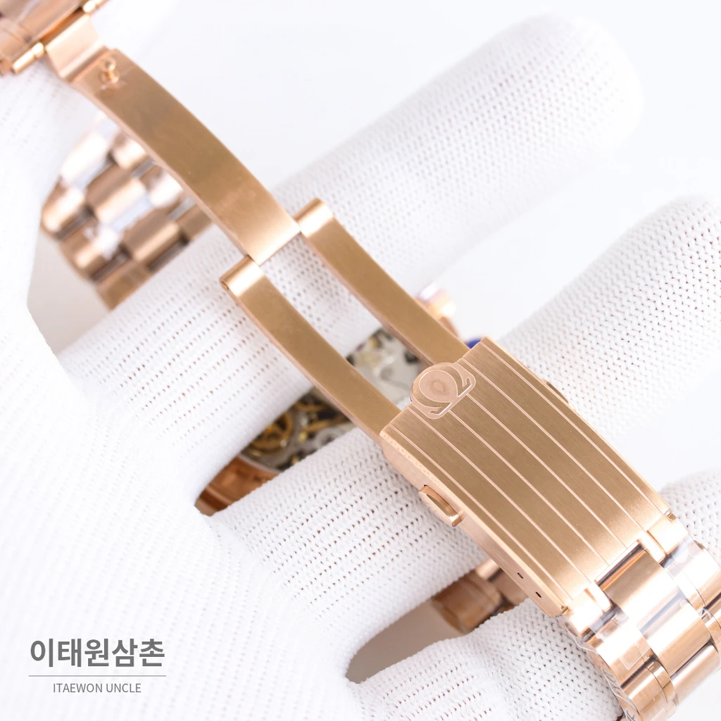 오메가 스피드마스터 프로페셔널 문샤인골드 로즈골드베젤 그린다이얼 크로노그래프 수동 42mm