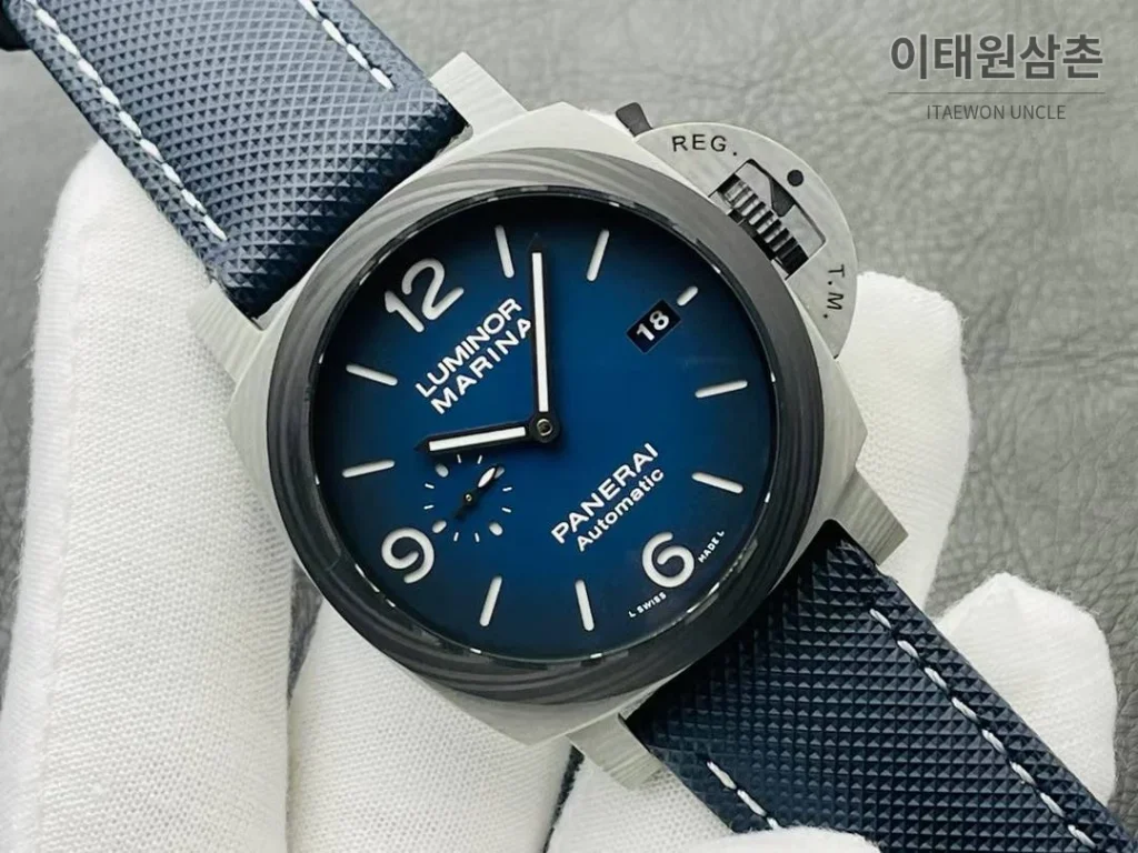 파네라이 루미노르 PAM1663 카본 스모크블루다이얼 오토매틱 44mm 네이비 러버 스트랩
