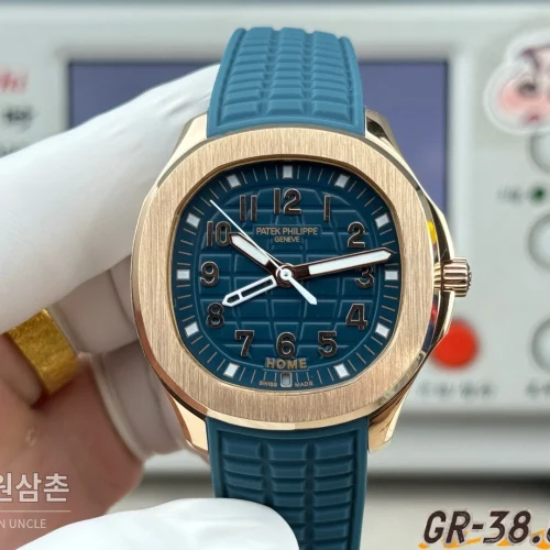 파텍필립 아쿠아넛 오토매틱 38.8mm 네이비 다이얼 블루 러버 스트랩 로즈골드 베젤