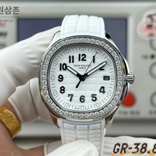 파텍필립 아쿠아넛 오토매틱 38.8mm 화이트 다이얼 화이트 러버 스트랩 실버 베젤