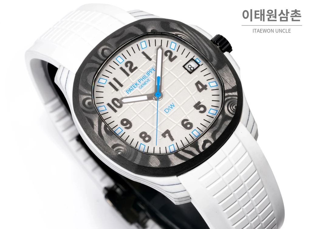 파텍필립 아쿠아넛 5167 카본 화이트 블루 다이얼 오토매틱 40.8mm