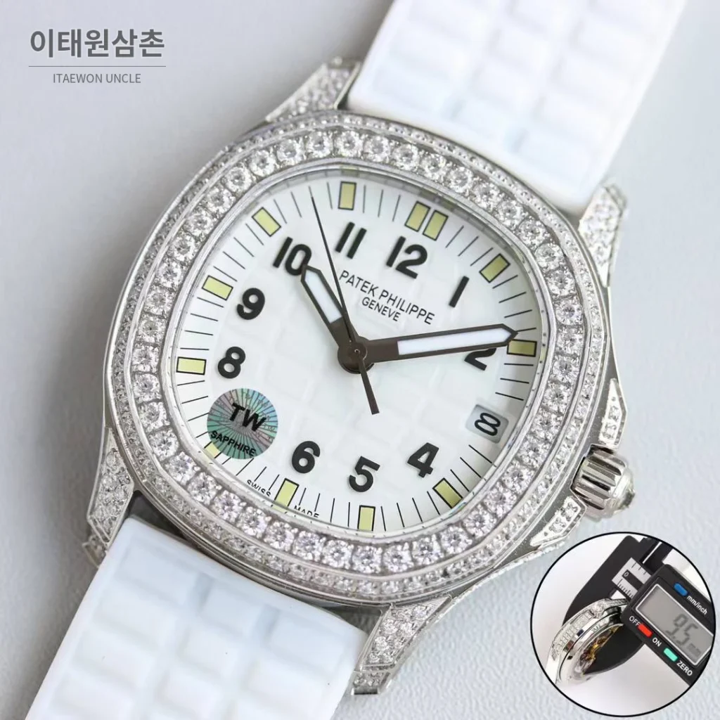 파텍필립 아쿠아넛 스틸 다이아세팅 블랙다이얼 오토매틱 35.6mm 화이트 러버 스트랩