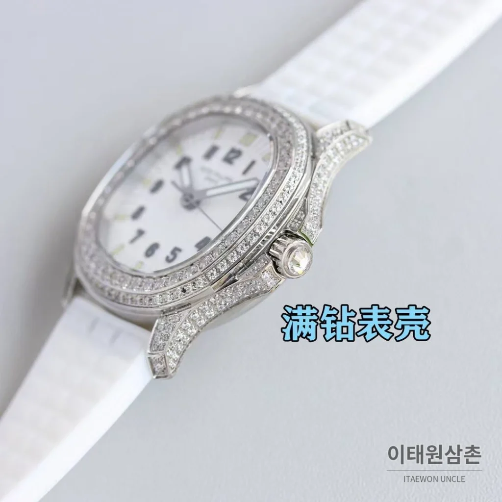 파텍필립 아쿠아넛 스틸 다이아세팅 블랙다이얼 오토매틱 35.6mm 화이트 러버 스트랩