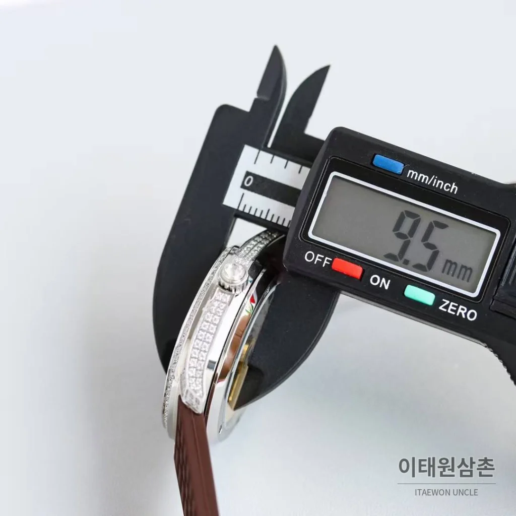 파텍필립 아쿠아넛 스틸 다이아세팅 블랙다이얼 오토매틱 35.6mm 브라운 러버 스트랩