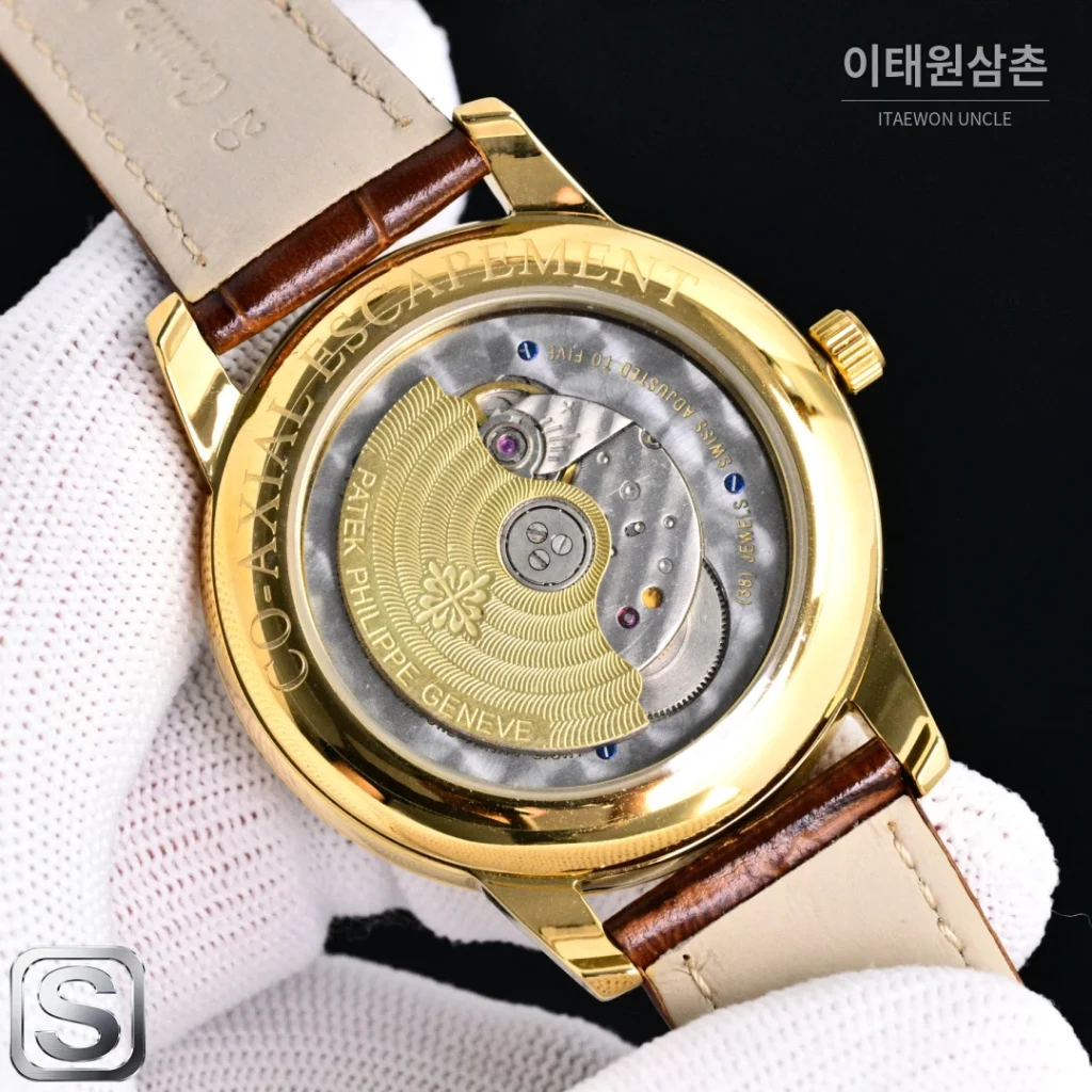 파텍필립 칼라트라바 오토매틱 42mm 샴페인 다이얼 브라운 가죽 스트랩 골드 베젤