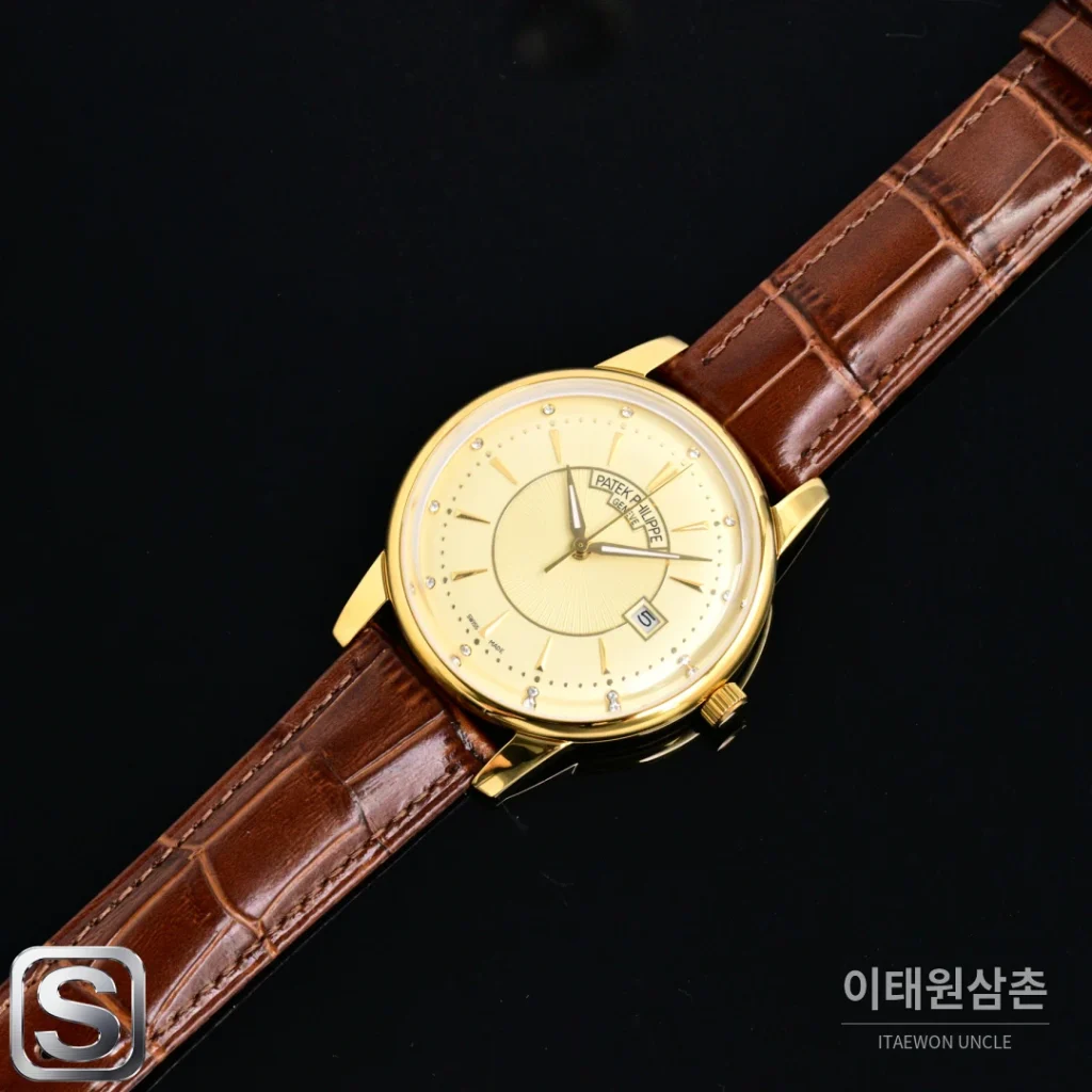 파텍필립 칼라트라바 오토매틱 42mm 샴페인 다이얼 브라운 가죽 스트랩 골드 베젤