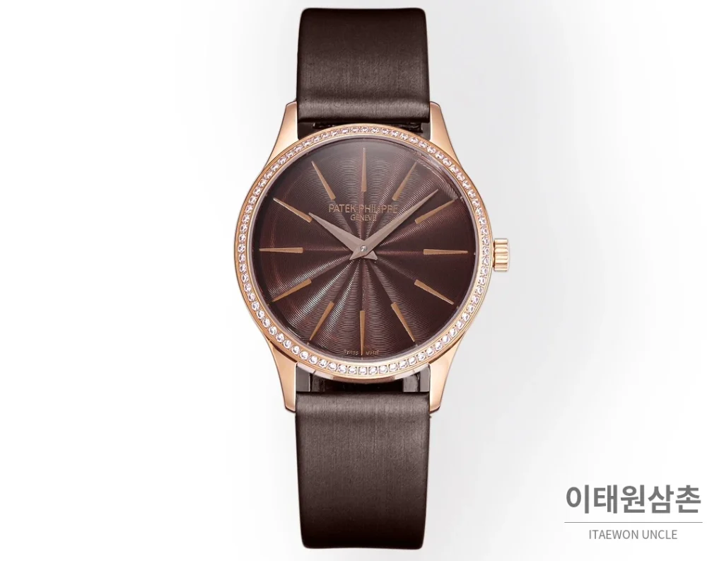 파텍필립 칼라트라바 골드베젤 브라운 엠보싱다이얼 울트라씬 오토매틱 35mm