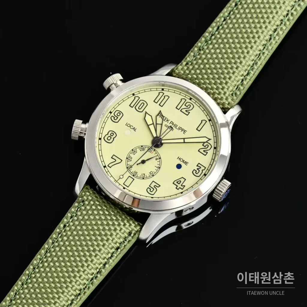 파텍필립 칼라트라바 파일럿 트래블타임 스틸 블랙다이얼 GMT 오토매틱 40.8mm 그린 나일론 스트랩