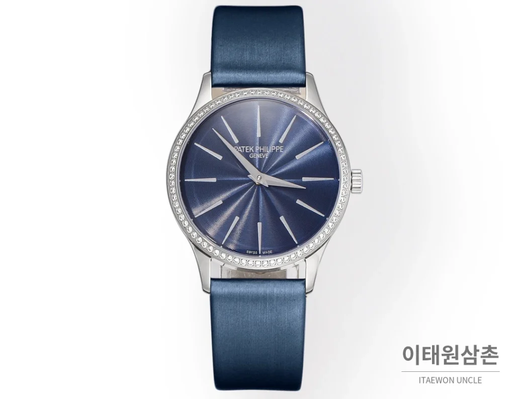 파텍필립 칼라트라바 실버베젤 네이비 엠보싱다이얼 울트라씬 오토매틱 35mm
