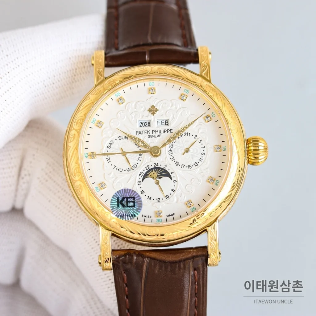 파텍필립 칼라트라바 스틸 퍼페추얼캘린더 문페이즈 오토매틱 42mm 옐로우 다이얼 브라운 가죽 스트랩 골드 베젤