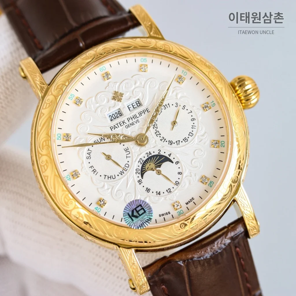 파텍필립 칼라트라바 스틸 퍼페추얼캘린더 문페이즈 오토매틱 42mm 옐로우 다이얼 브라운 가죽 스트랩 골드 베젤