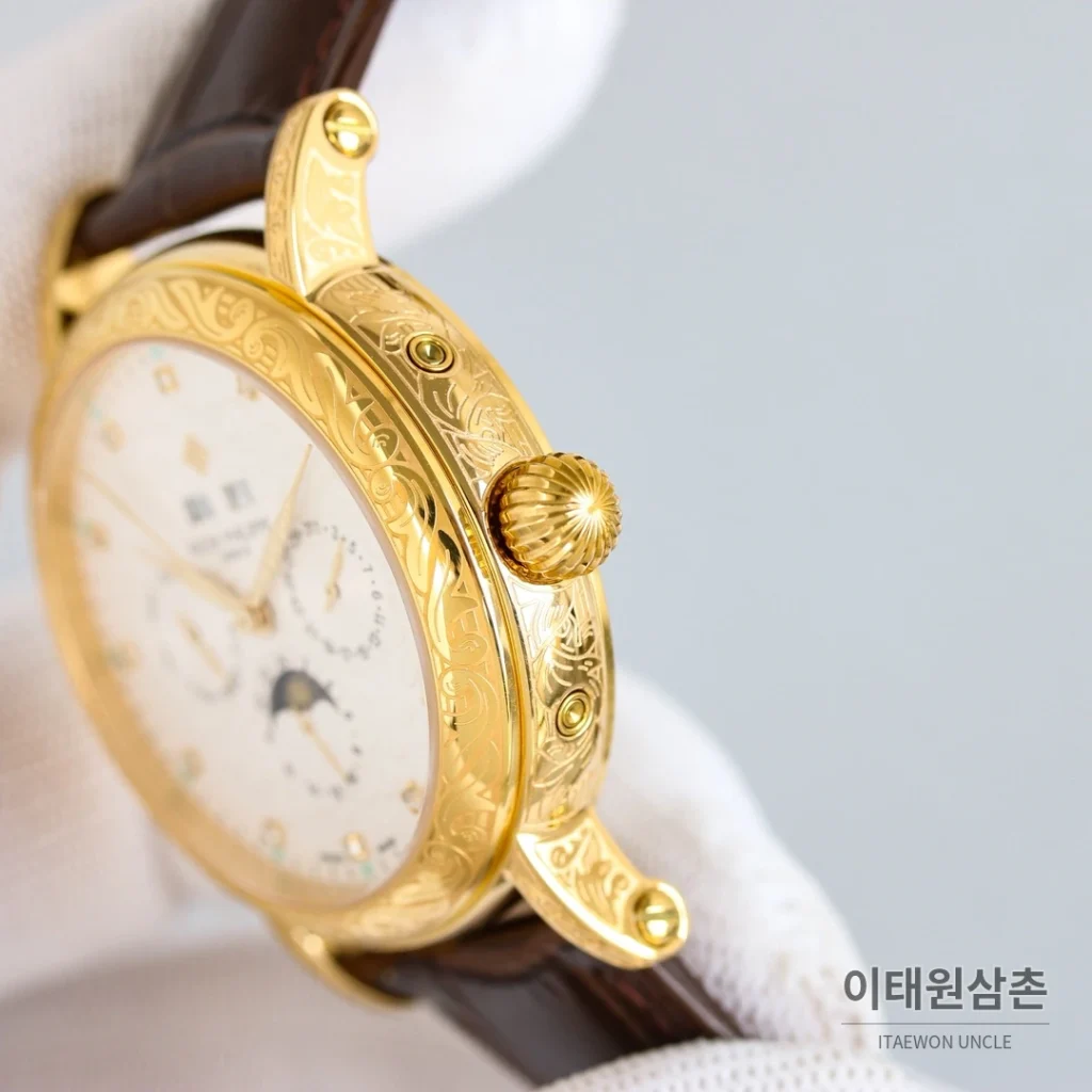 파텍필립 칼라트라바 스틸 퍼페추얼캘린더 문페이즈 오토매틱 42mm 옐로우 다이얼 브라운 가죽 스트랩 골드 베젤